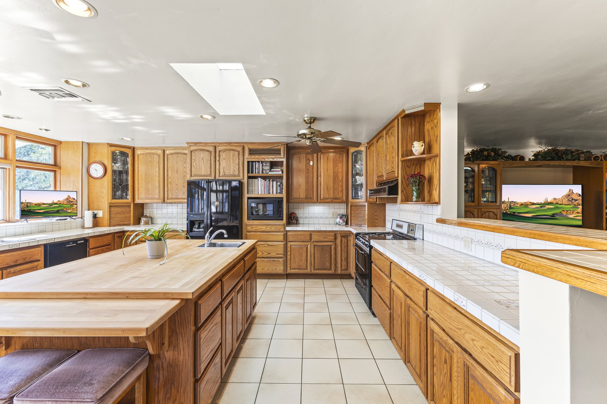 Kitchen with an island and extensive cabinetry