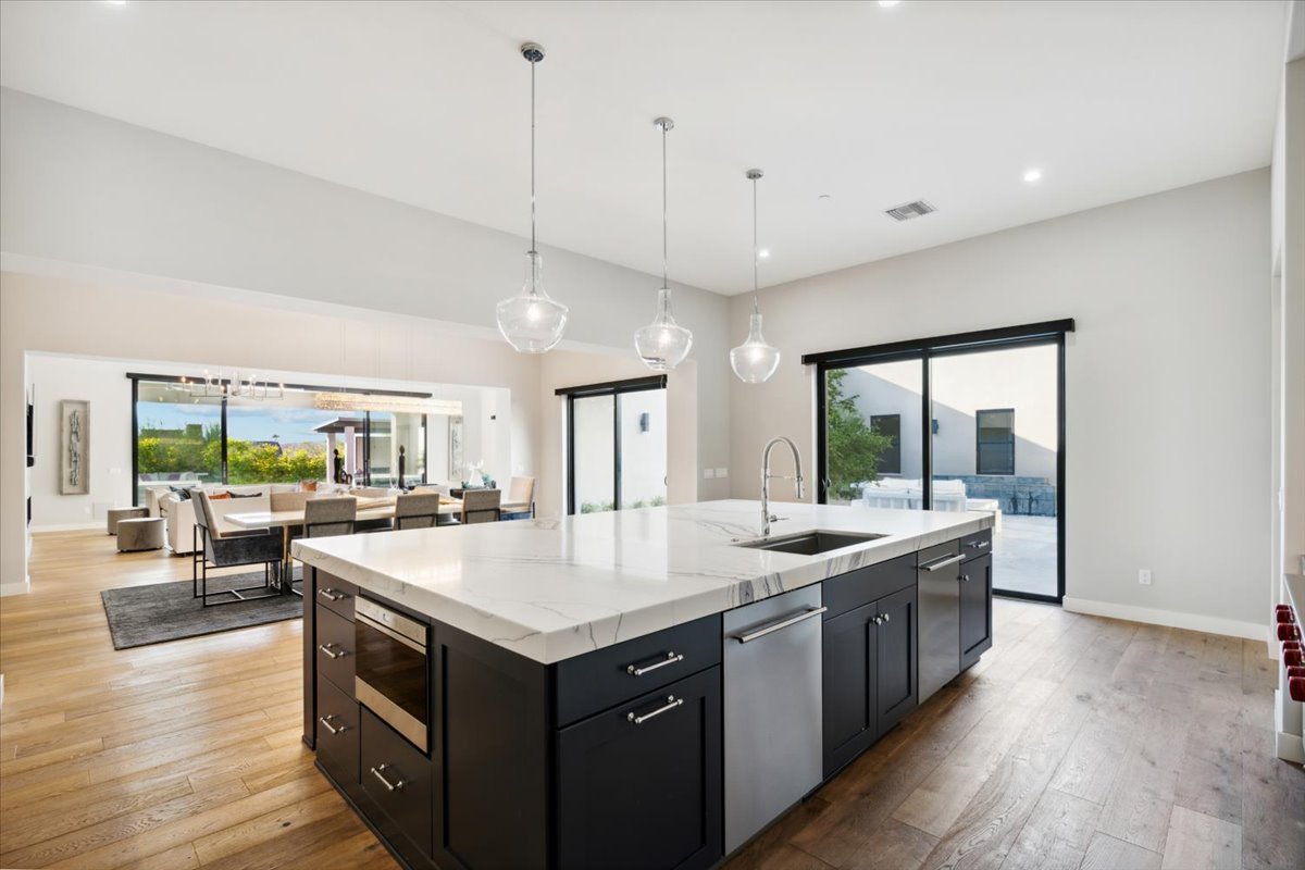 Kitchen island with seating and granite countertops