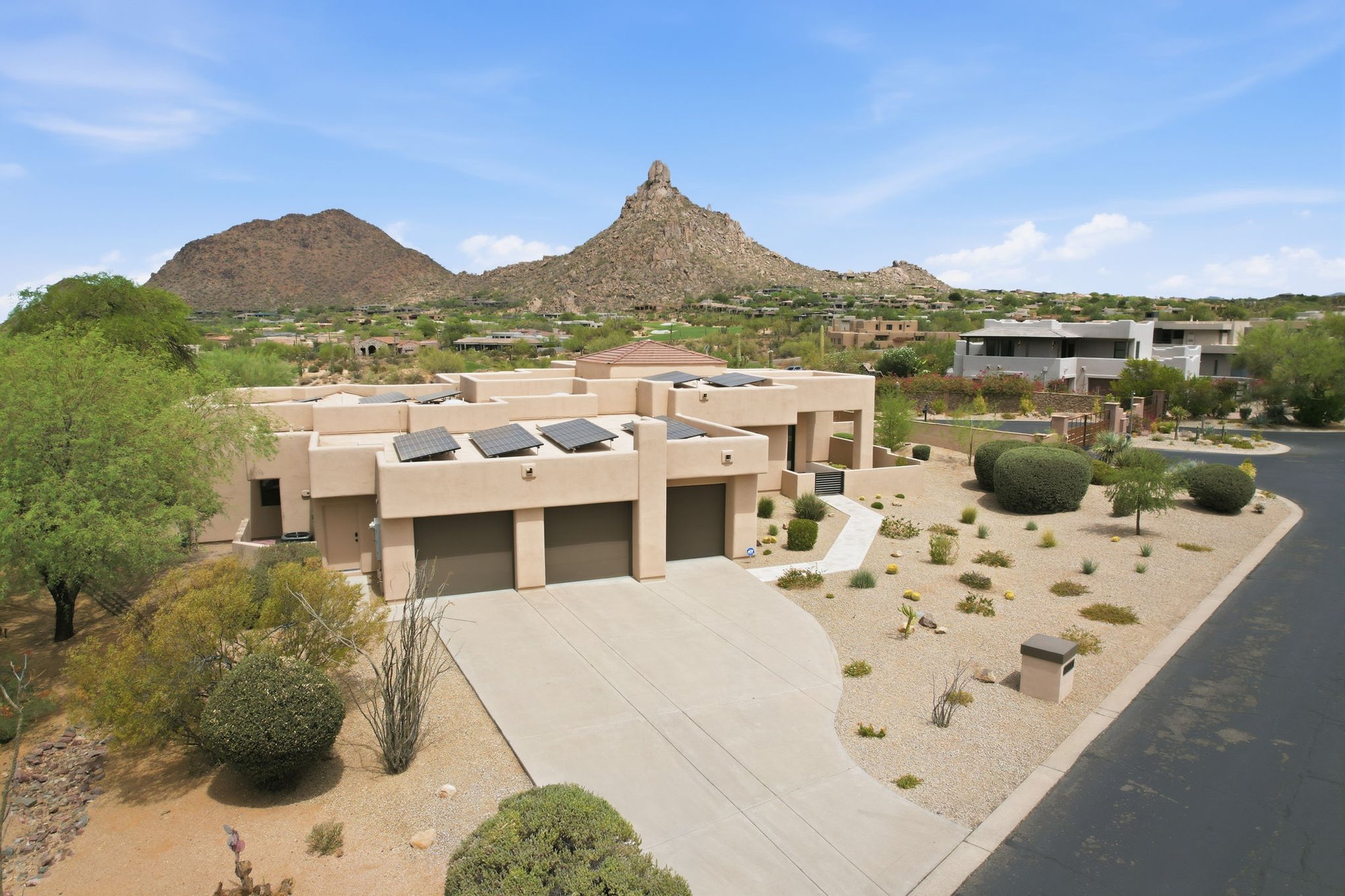 Aerial view of the front of 25838 N 104th Pl in Scottsdale with Pinnacle Peak in the background