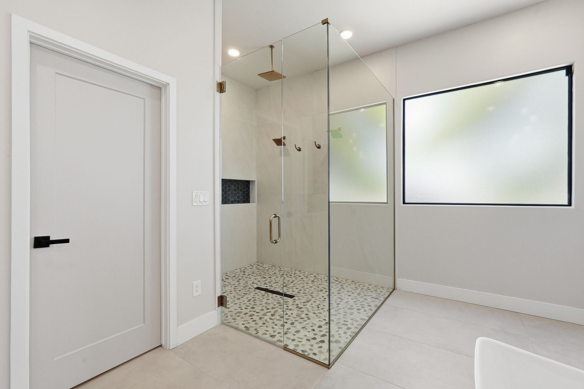 Guest bathroom with a glass enclosed shower