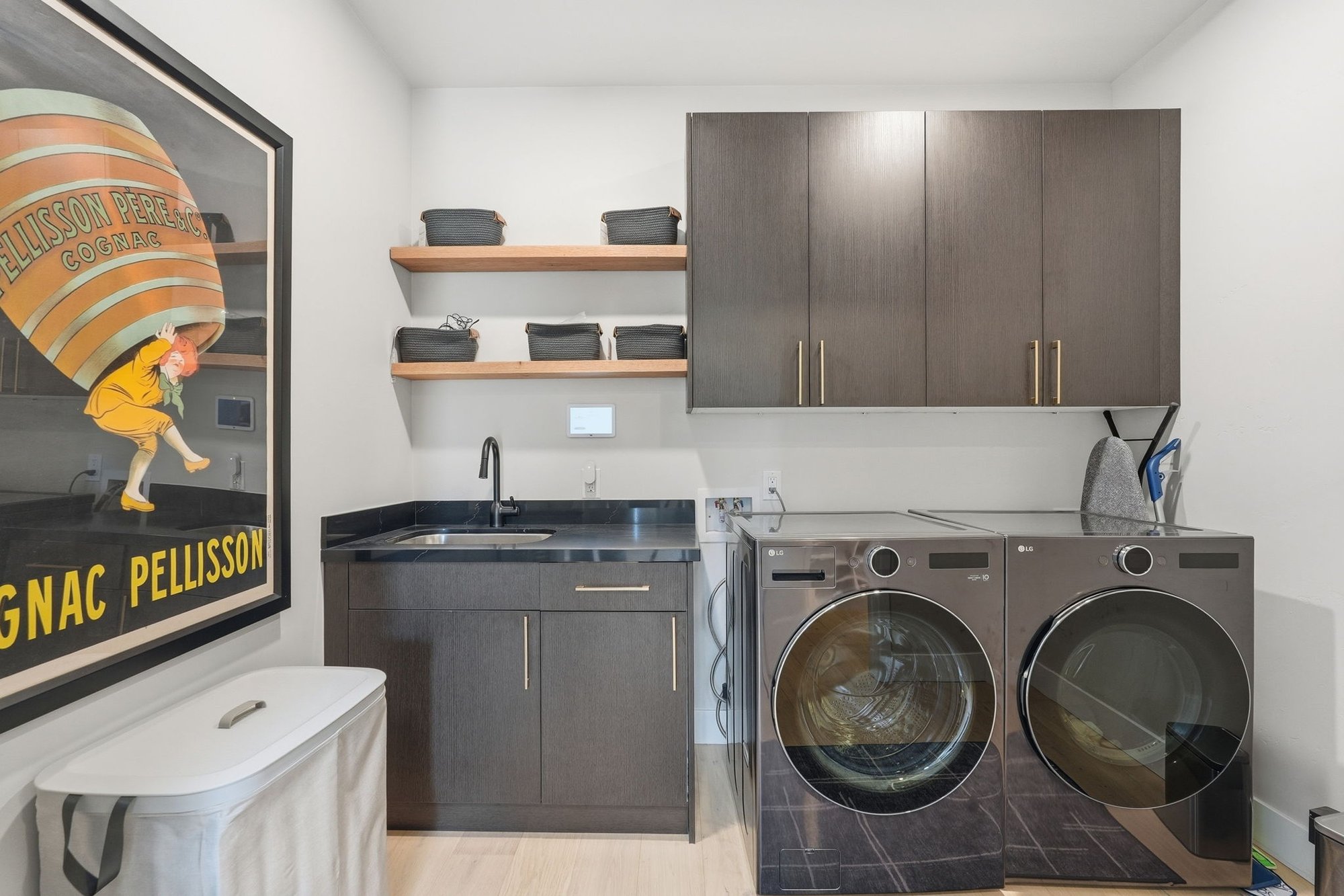 Laundry room with built in cabinetry