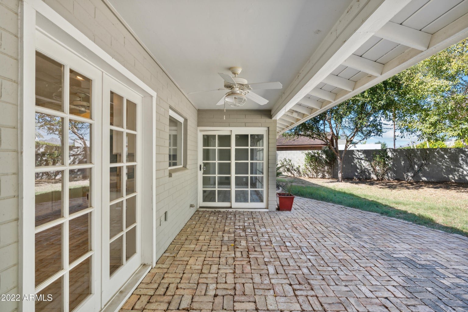 Covered brick patio off the living areas