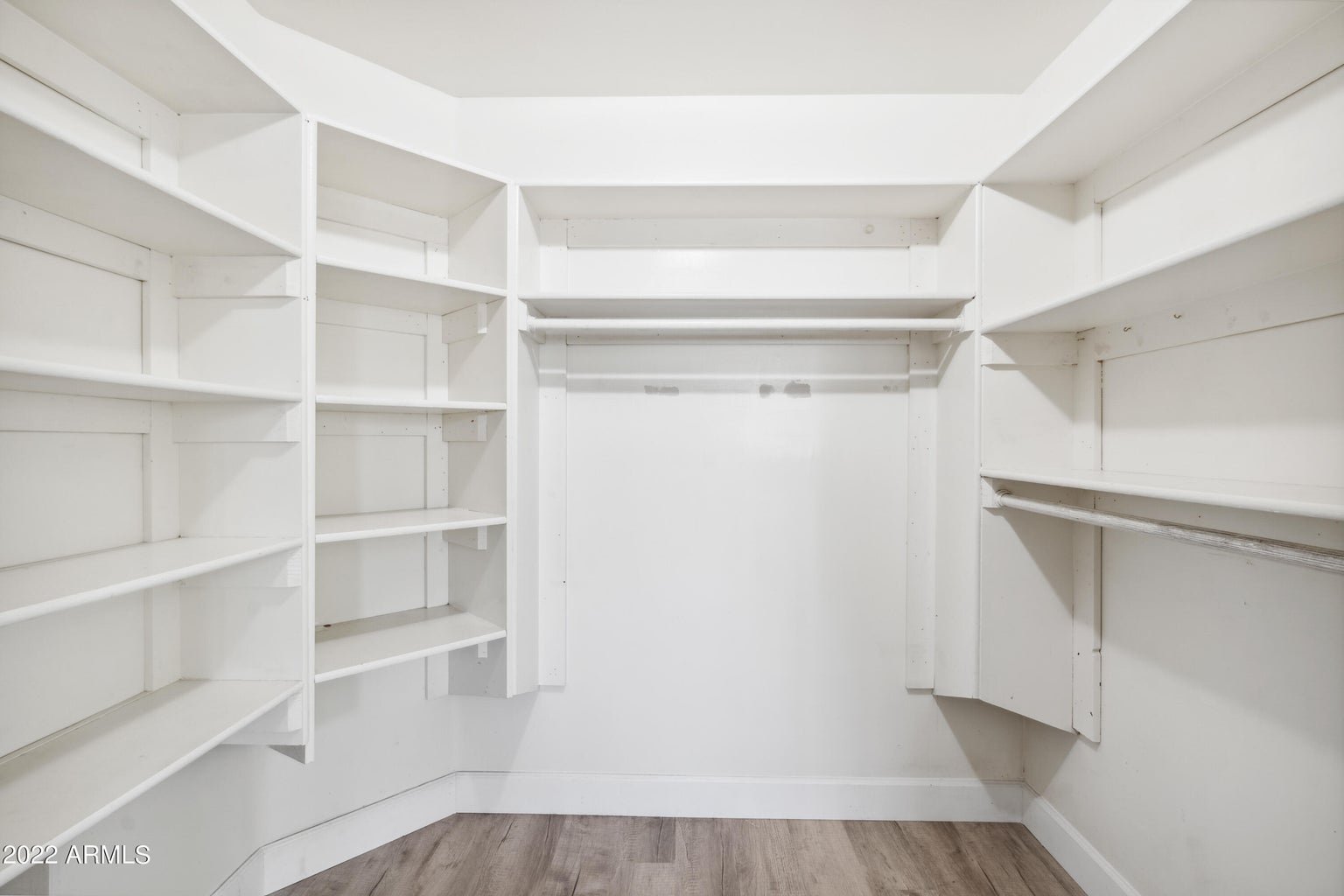Primary closet with built in shelving