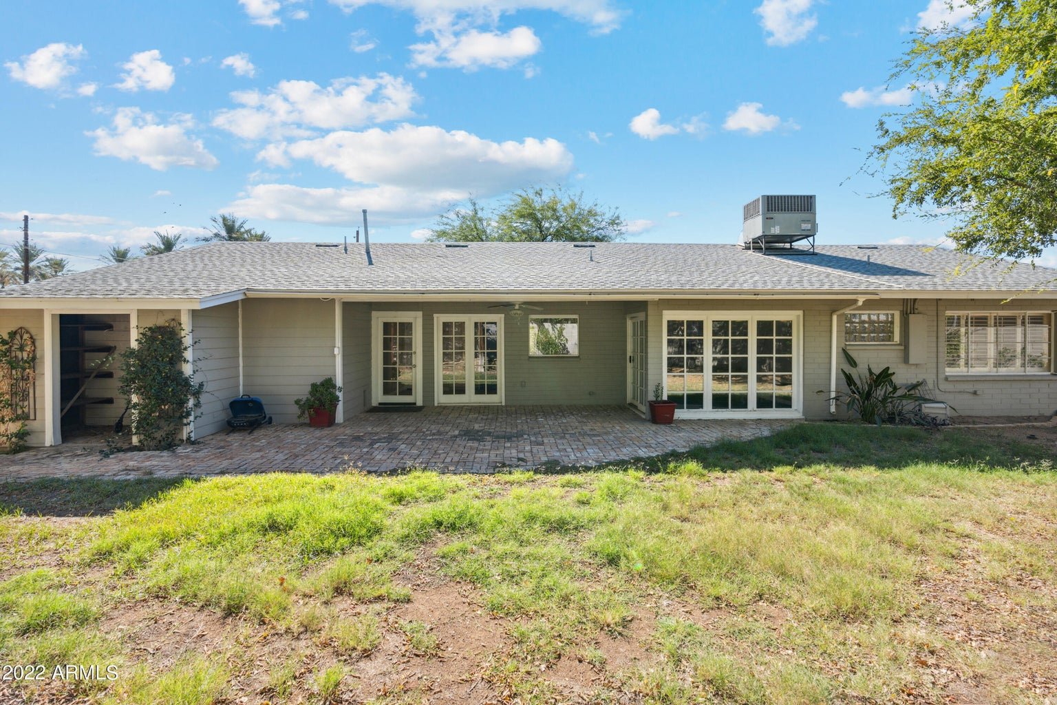 Rear exterior of the home and private yard