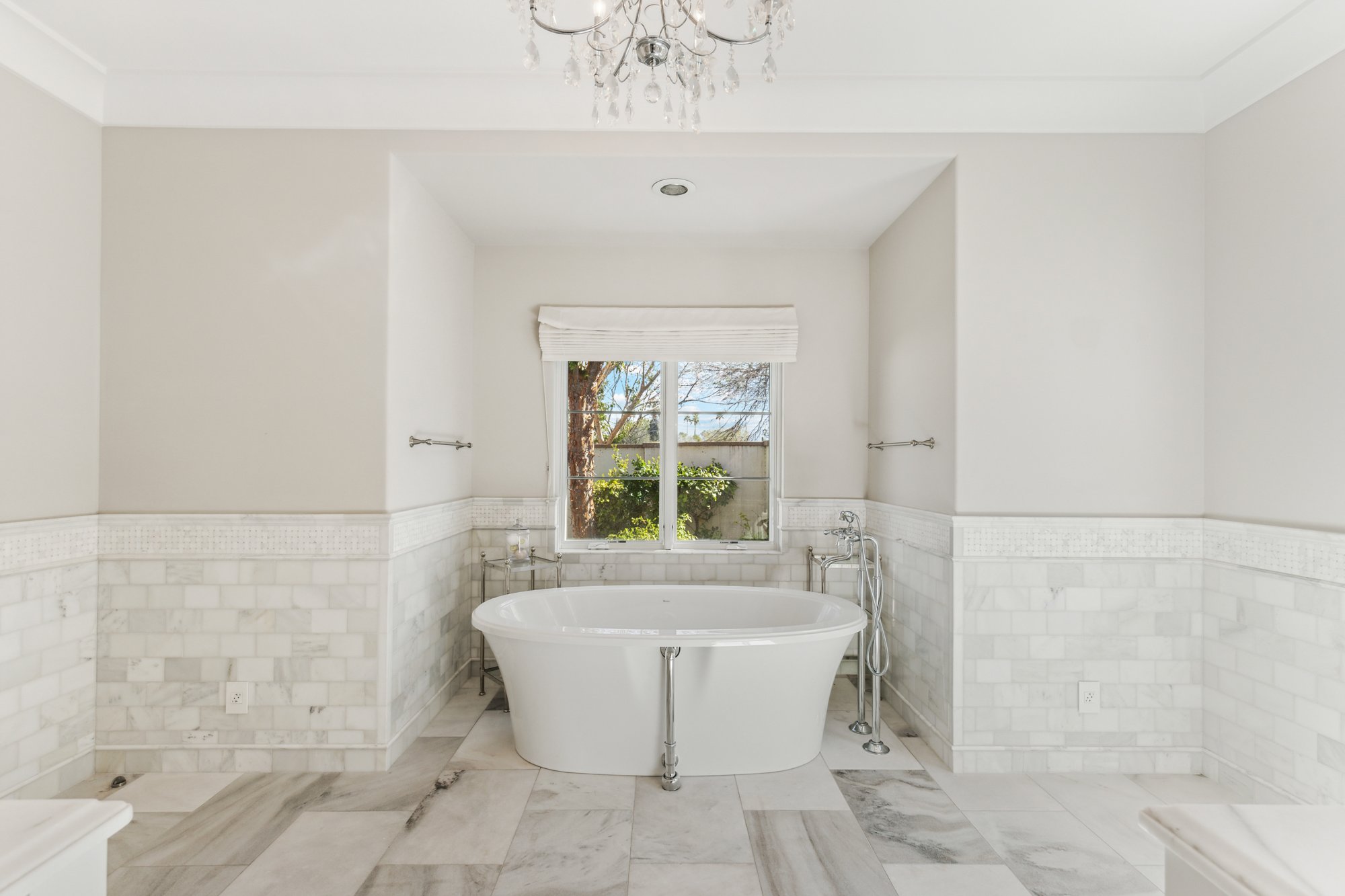 Primary bathroom freestanding soaking tub