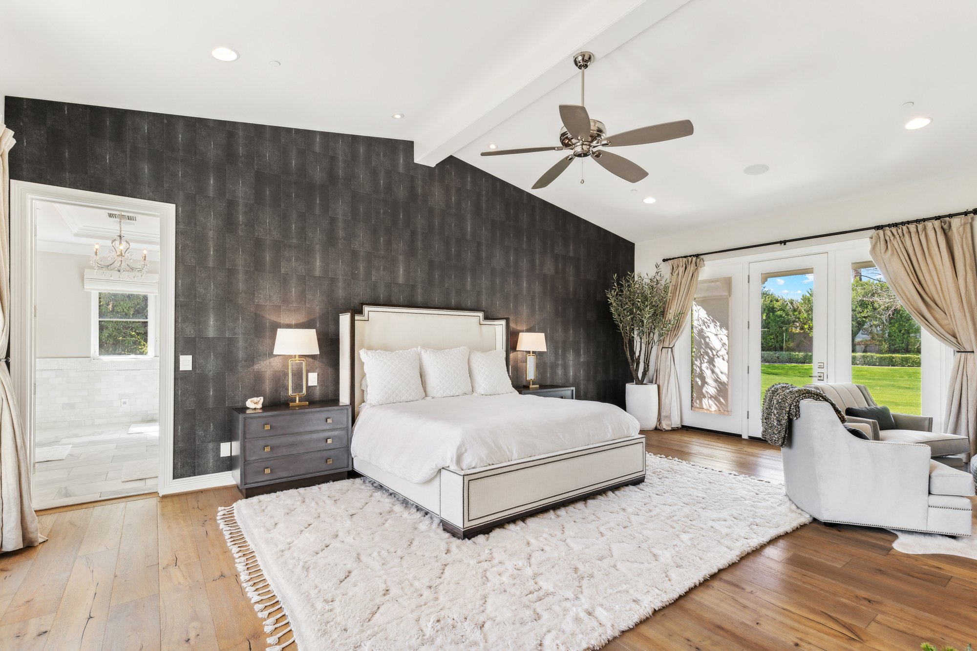 Primary bedroom sitting area with fireplace