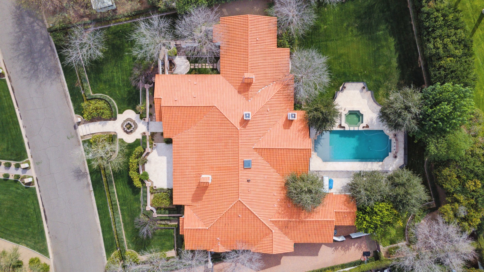 Aerial view of the tile roof and pool at 5840 N 70th Pl
