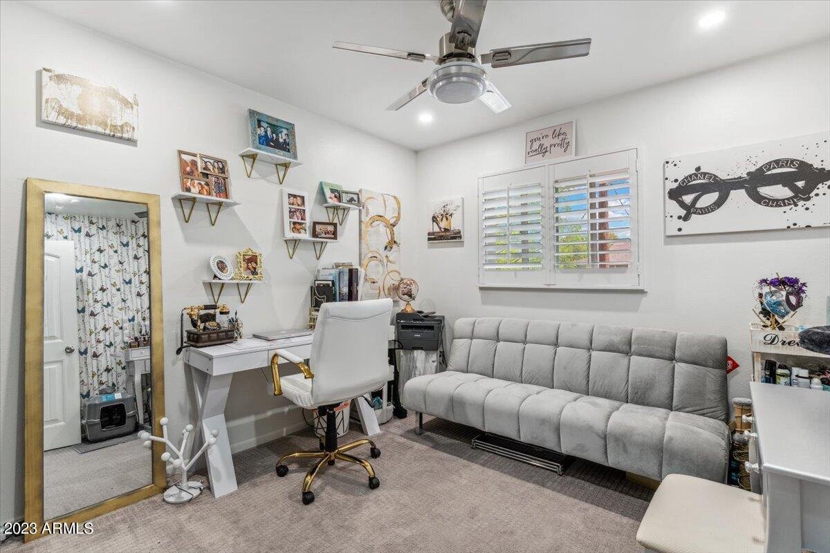 Second bedroom styled as a home office