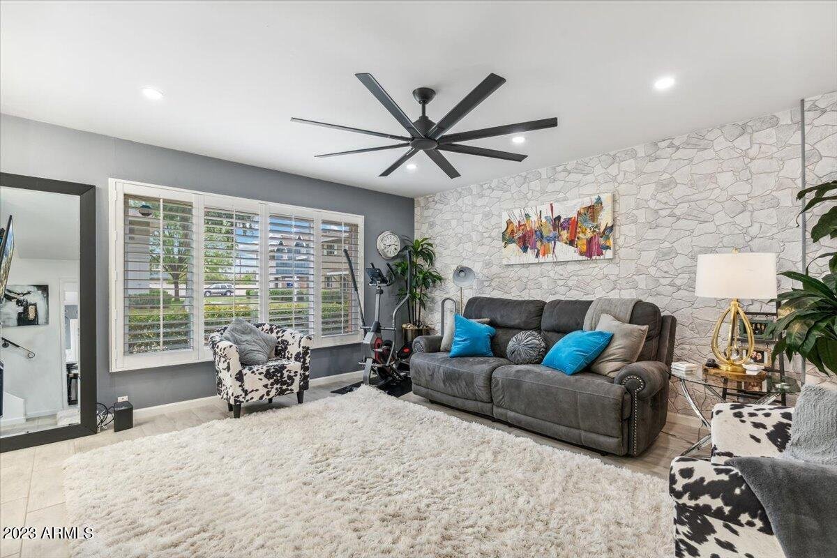 Living room with plantation shutters and natural light