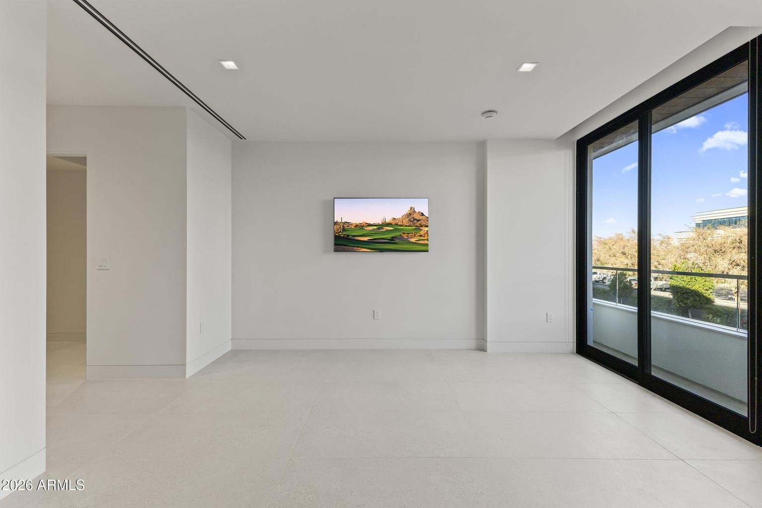 Bedroom with courtyard and mountain view windows