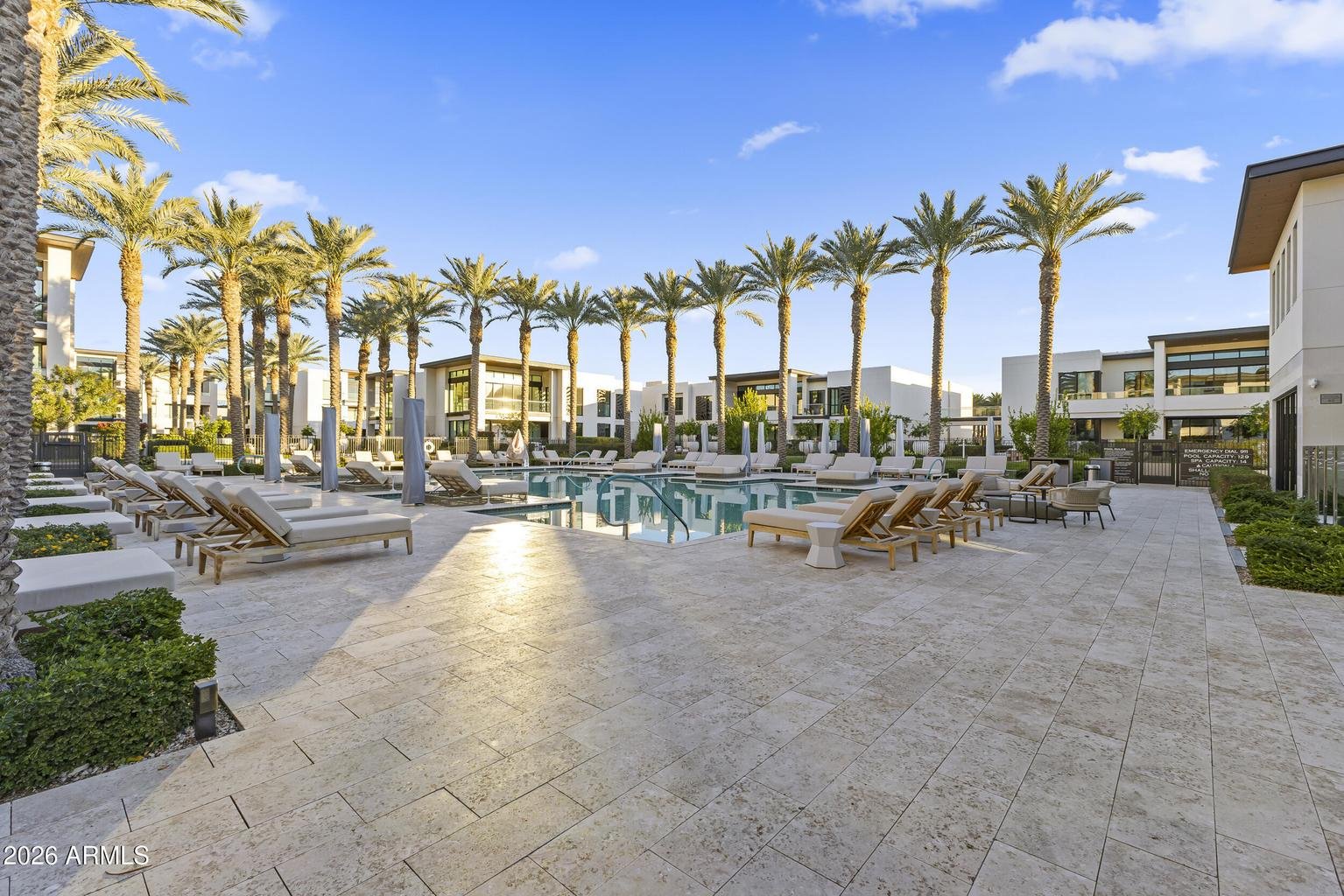Poolside lounge seating at The Ritz-Carlton Residences