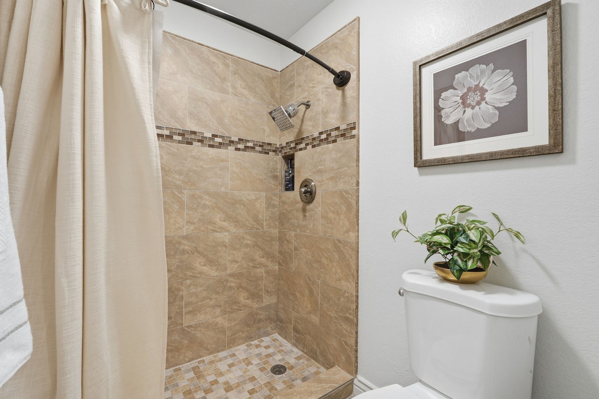 Bathroom with a tiled walk-in shower