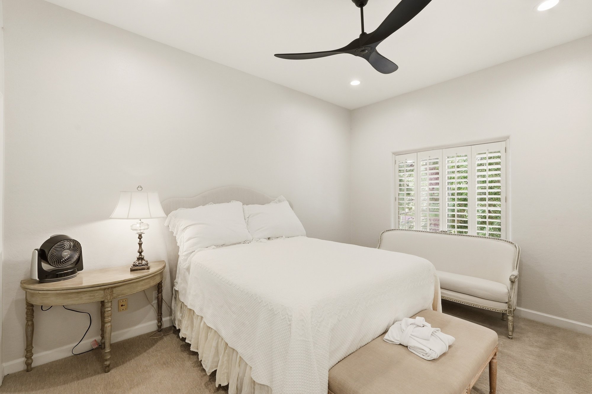 Primary bedroom with a sitting area